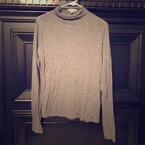 Grey turtleneck.